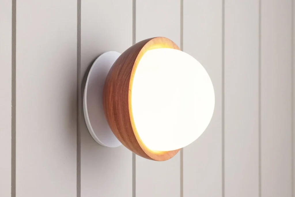 Button sconce by Fluxwood